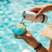 Whiteout Blitz coktail in a pool party