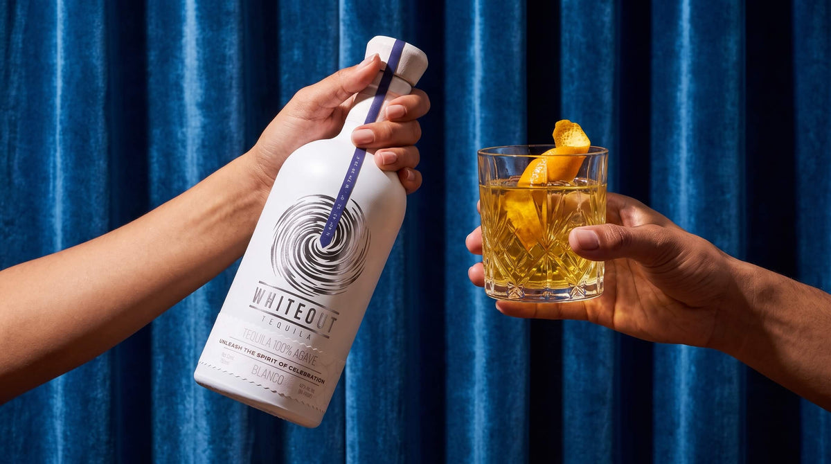 Whiteout Tequila Blanco paired with a Stateside Blues cocktail  styled against a blue velvet background for a premium cocktail recipe.